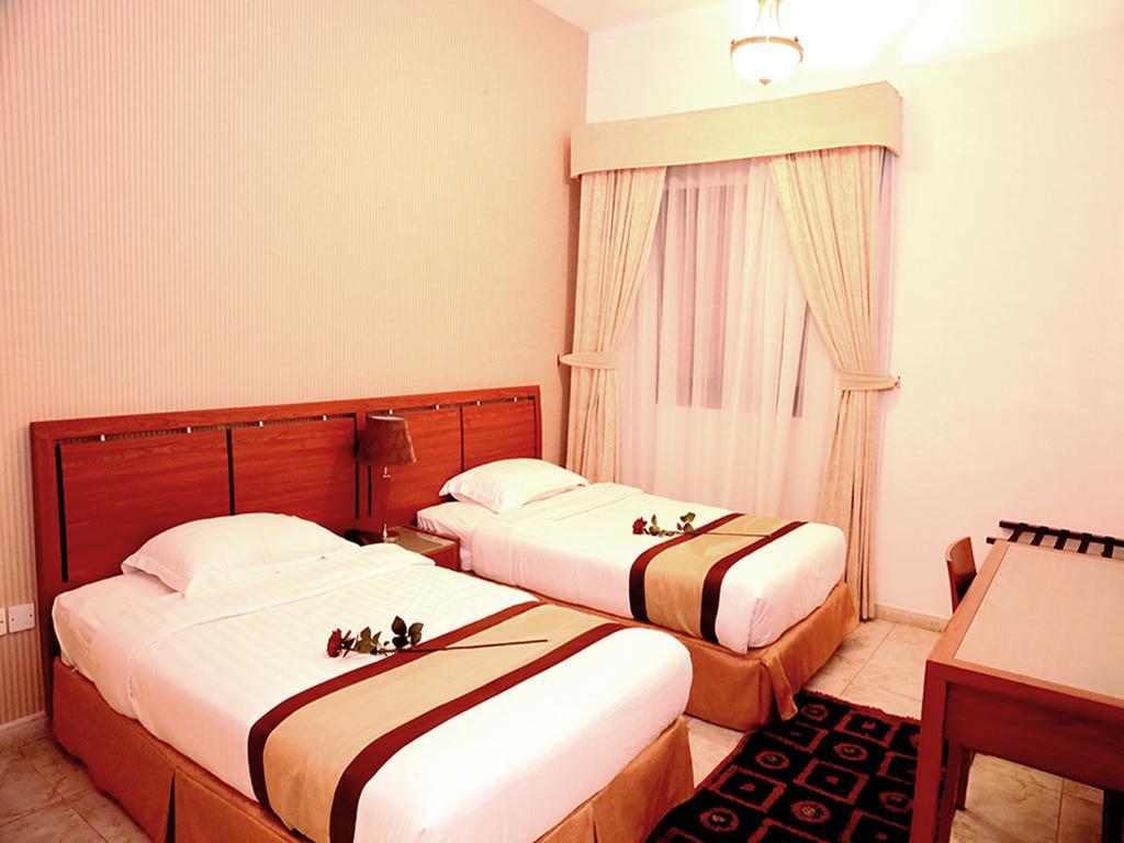 Arcadia Hotel Suites Sharjah Phòng bức ảnh
