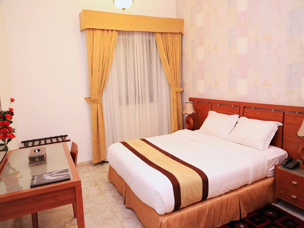 Arcadia Hotel Suites Sharjah Phòng bức ảnh